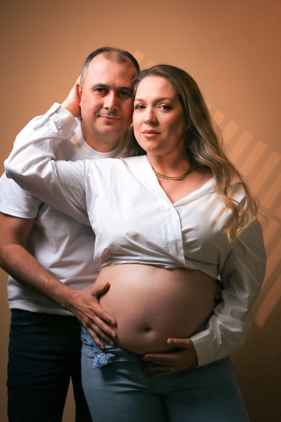 Retrato próximo de Deborah e Wellington olhando para a câmera