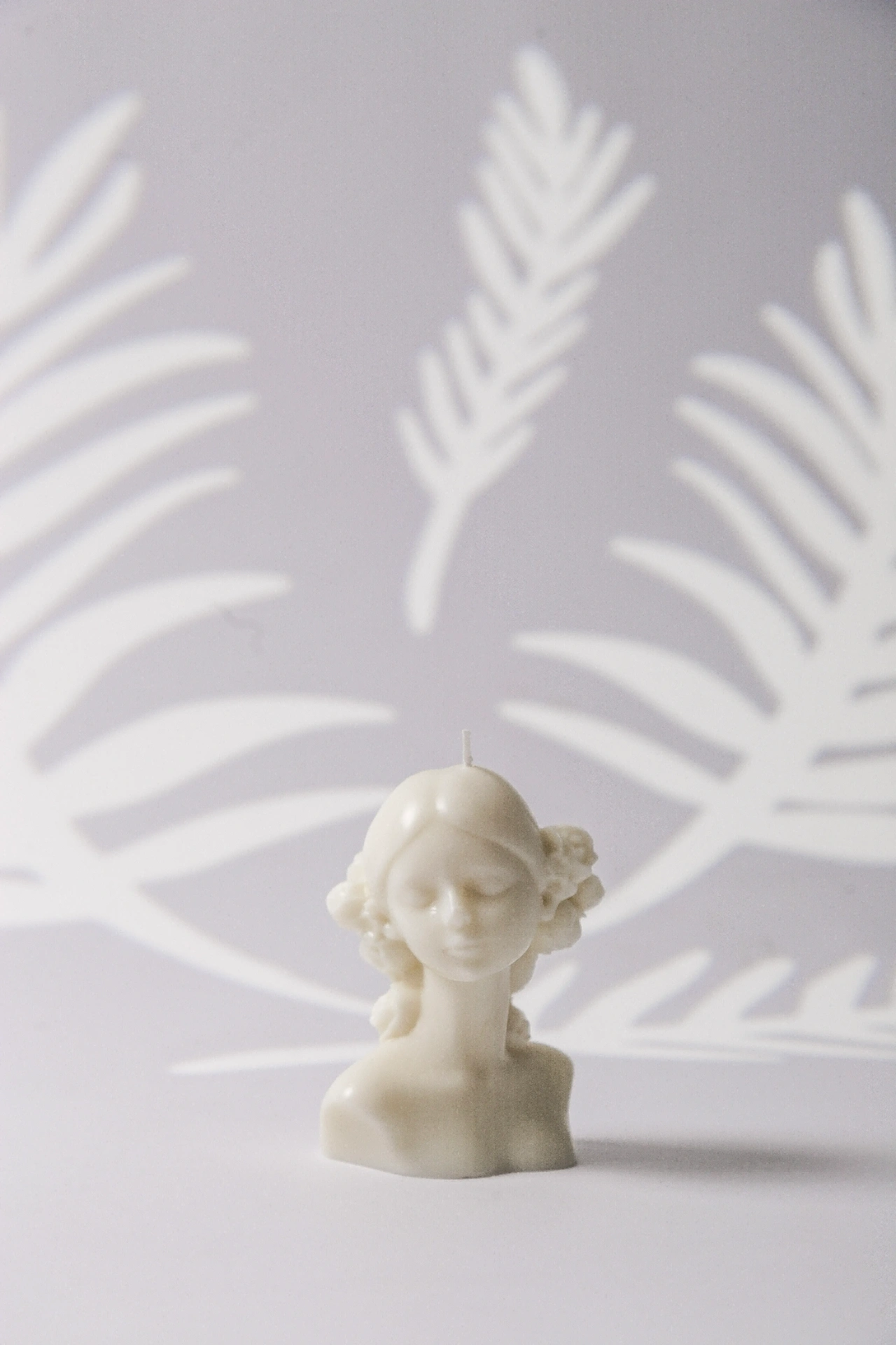 Fotografía de productos en São Paulo — fotografía de Vela artesanal Amber busto feminino com folhas