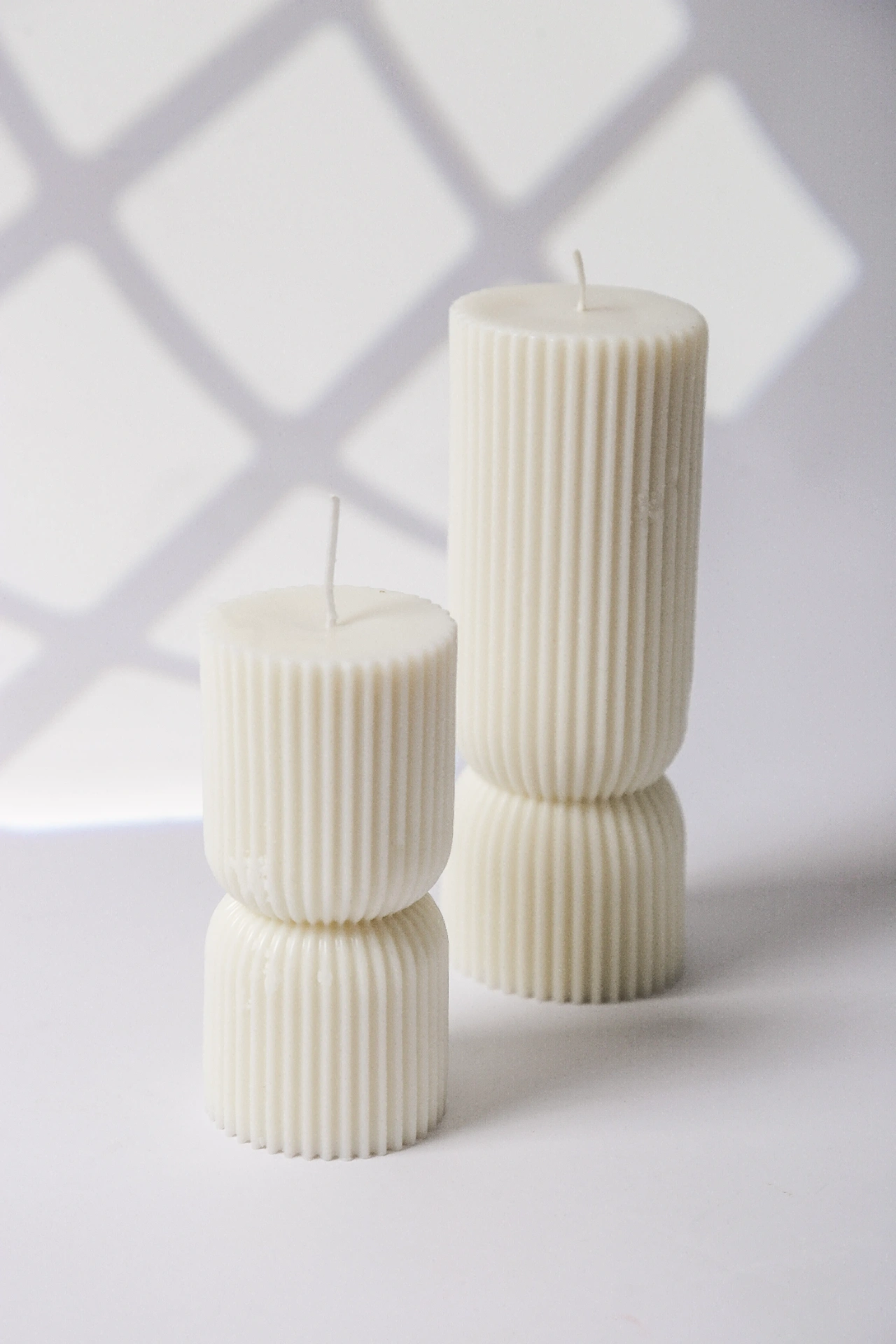 Fotografía de productos en São Paulo — fotografía de Par de velas Amber ranhuradas em coluna